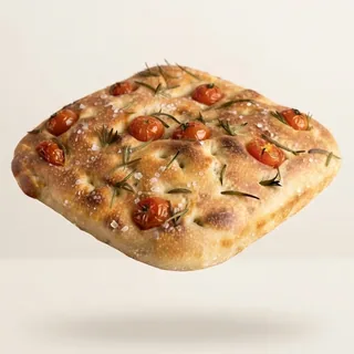 Sourdough focaccia studded with roasted cherry tomatoes, rosemary and sea salt.
